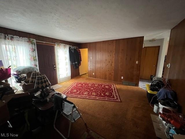 3335 N Maple Ln, Ashtabula, OH 44004 - living room with wooden walls