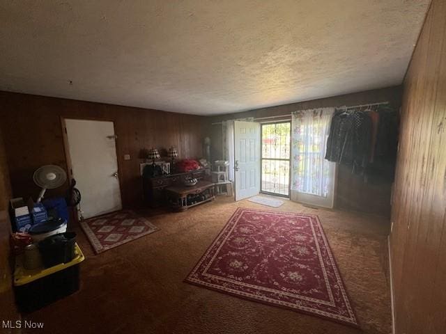 3335 N Maple Ln, Ashtabula, OH 44004 - interior space featuring wooden walls and a textured ceiling