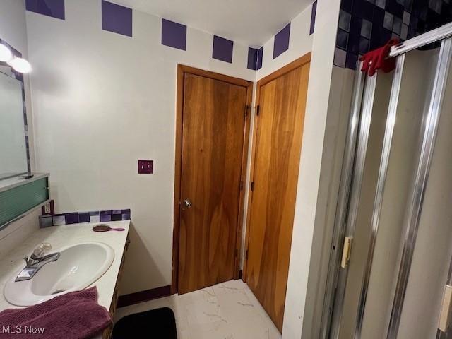3335 N Maple Ln, Ashtabula, OH 44004 - bathroom featuring vanity and an enclosed shower