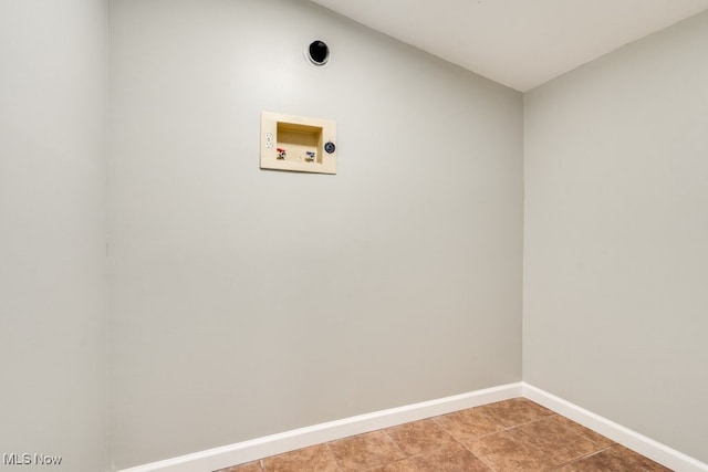 laundry area featuring washer hookup, laundry area, and baseboards