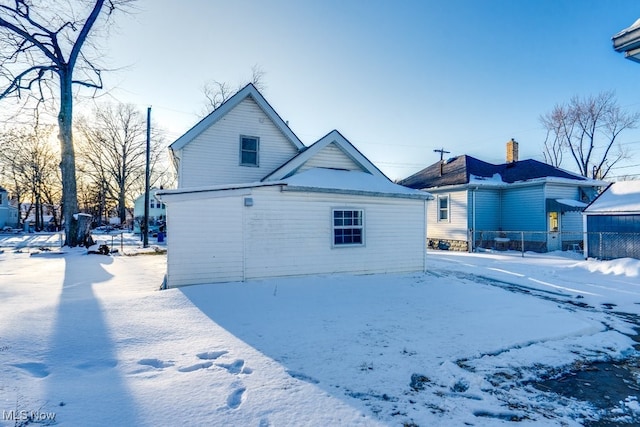 view of snow covered property