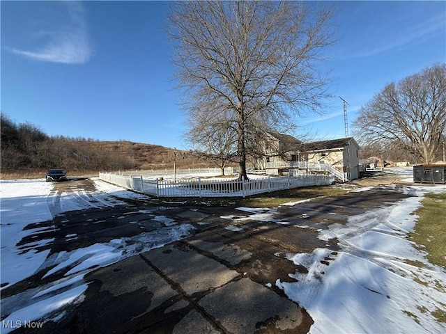 view of snow covered pool