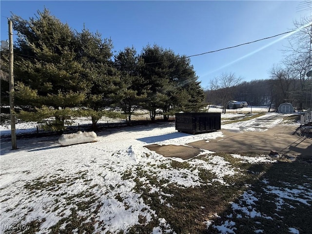 exterior space with a storage shed