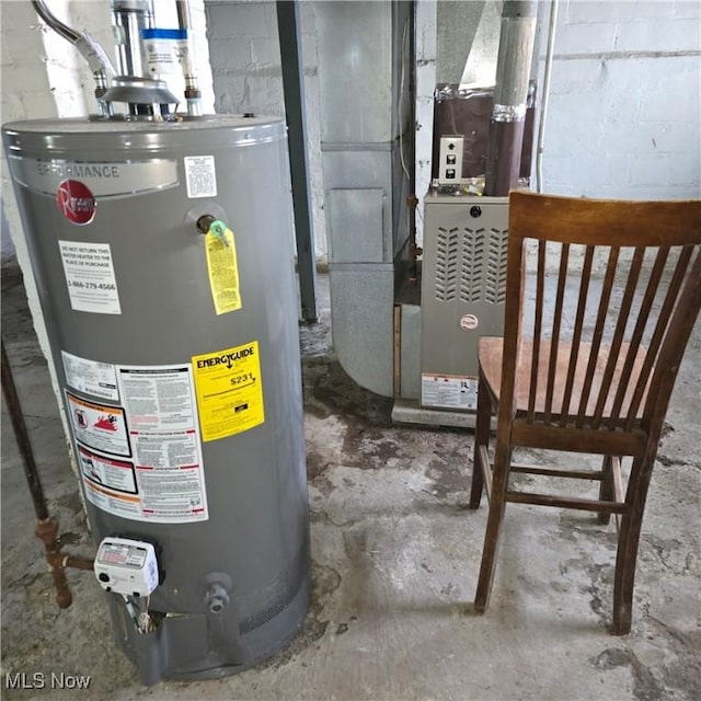 utility room featuring water heater