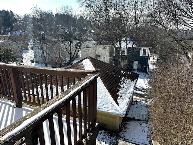 view of snow covered deck