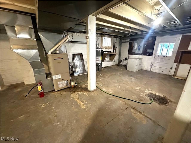 basement featuring secured water heater