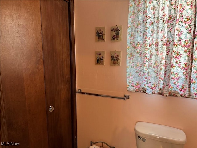 bathroom featuring toilet