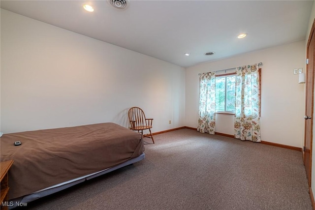 bedroom with carpet, baseboards, and visible vents