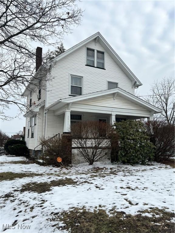 view of front of property featuring a chimney