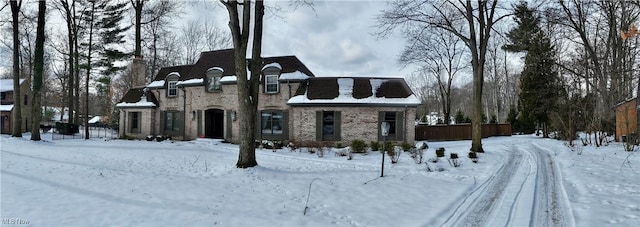 view of front of home featuring brick siding