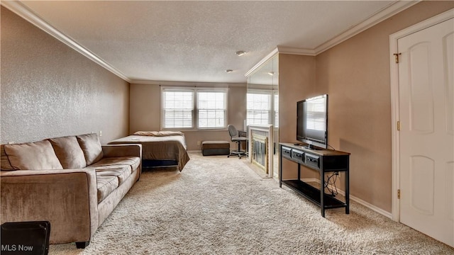 carpeted bedroom featuring a textured ceiling, a textured wall, baseboards, and crown molding