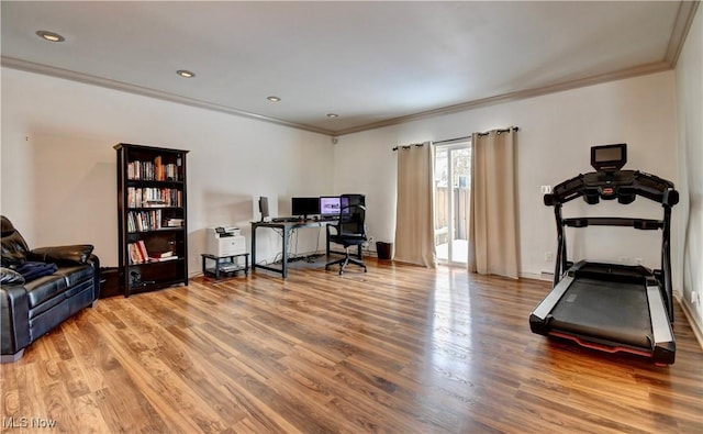 office space featuring ornamental molding, wood finished floors, and recessed lighting