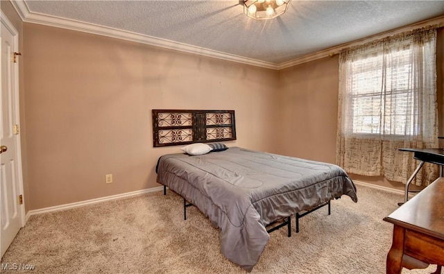 carpeted bedroom featuring a textured ceiling, baseboards, and crown molding