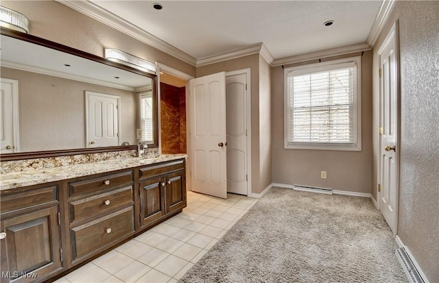 bathroom featuring baseboards, visible vents, ornamental molding, tile patterned floors, and vanity