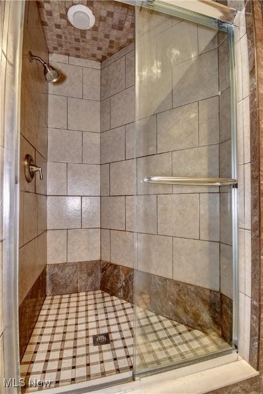 bathroom with a stall shower