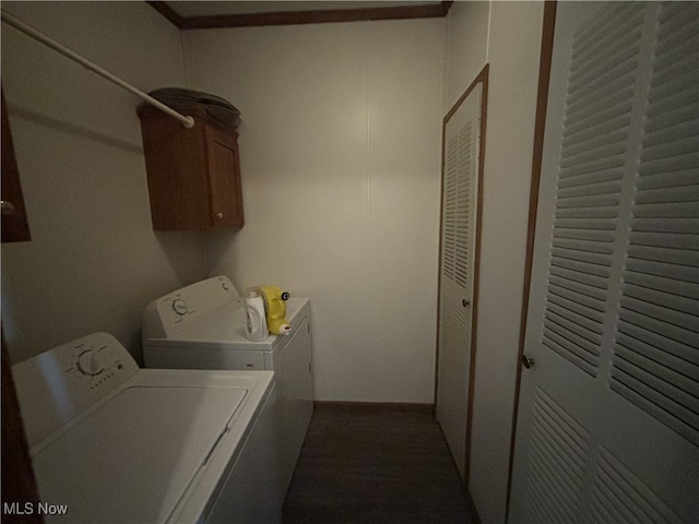 laundry area featuring washing machine and dryer and cabinet space