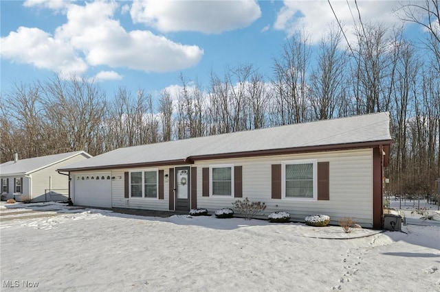 ranch-style house featuring an attached garage