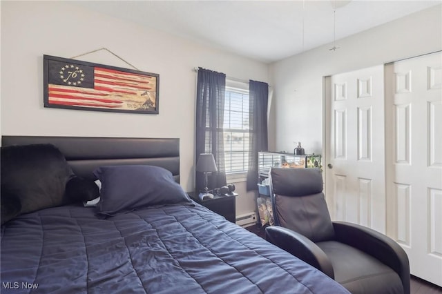 bedroom featuring baseboard heating