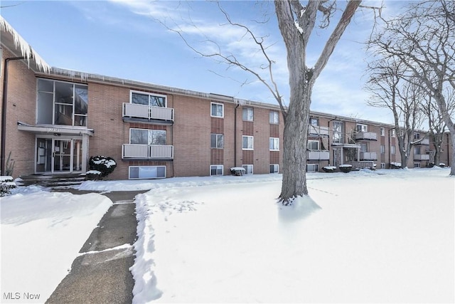 view of snow covered property