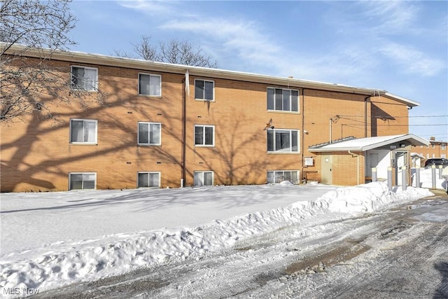 view of snow covered building