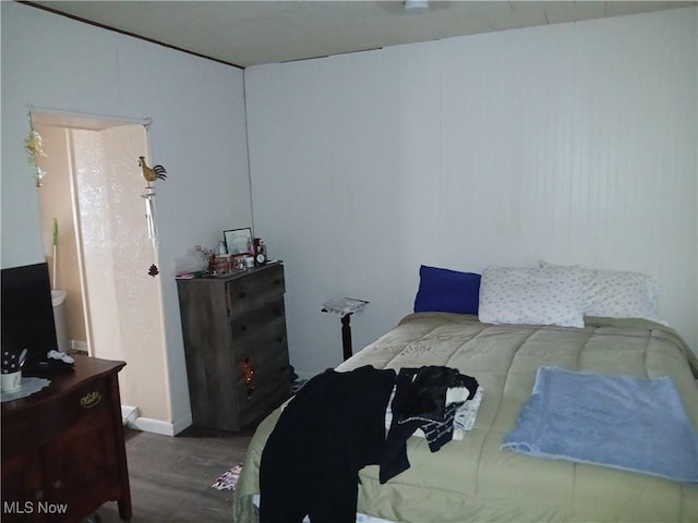 147 SW Saint Clair Ave, New Philadelphia, OH 44663 - bedroom featuring wood finished floors