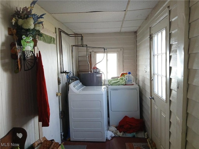 147 SW Saint Clair Ave, New Philadelphia, OH 44663 - laundry area featuring washing machine and dryer, laundry area, and electric water heater
