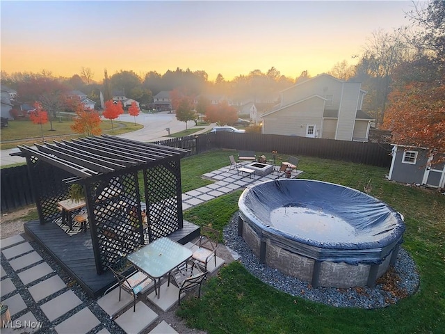 exterior space with a patio area and a fire pit