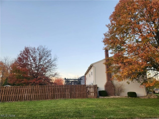 view of yard with fence