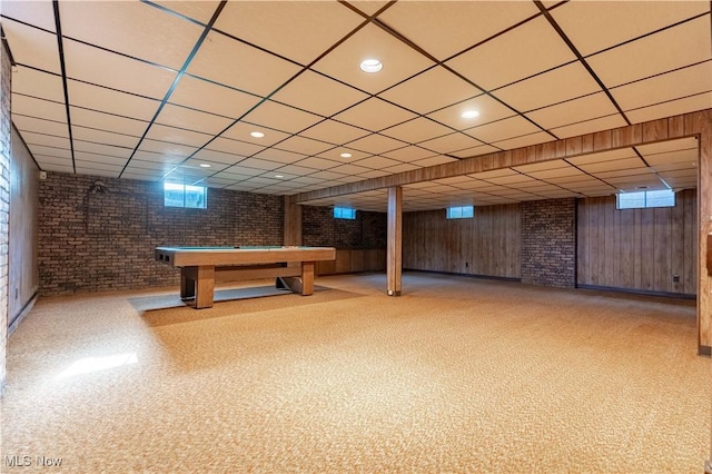 game room featuring billiards, brick wall, a paneled ceiling, wood walls, and recessed lighting