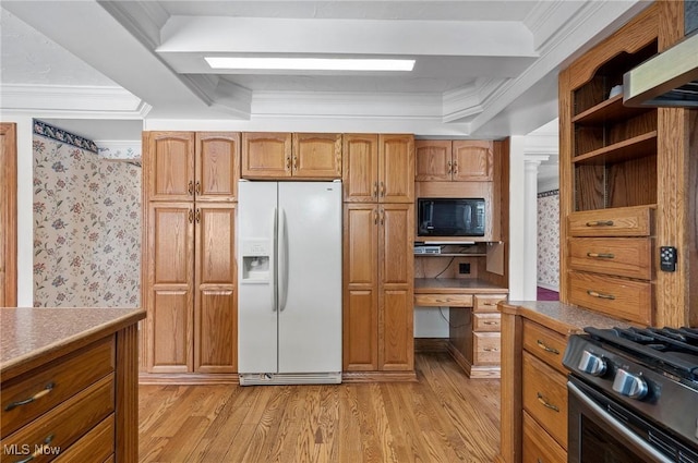 kitchen with white refrigerator with ice dispenser, light countertops, crown molding, black microwave, and stainless steel range with gas stovetop