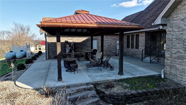 view of patio / terrace with a gazebo