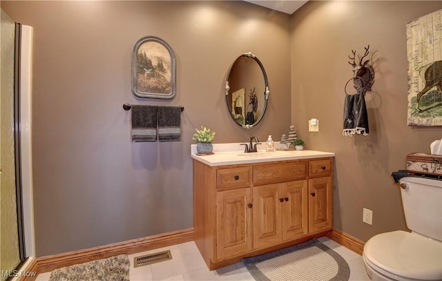 full bathroom featuring visible vents, toilet, a shower with shower door, vanity, and baseboards