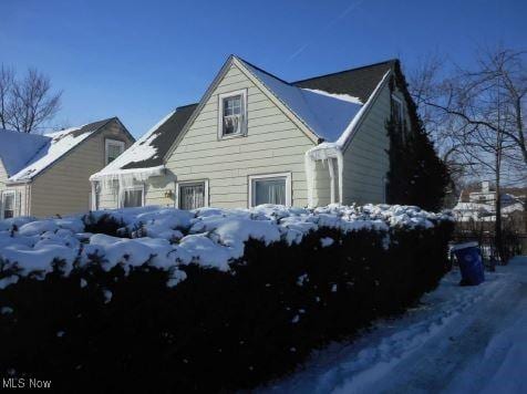 view of snow covered property