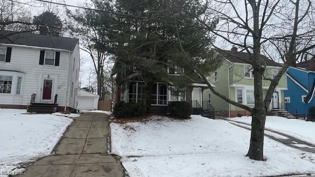 view of front of house with entry steps and a garage