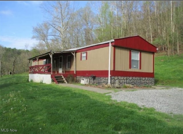 exterior space with a front yard