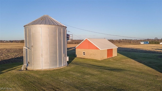 view of shed featuring a rural view