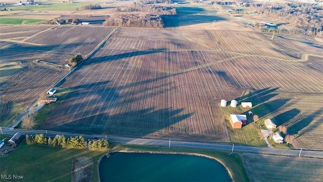 bird's eye view featuring a rural view and a water view