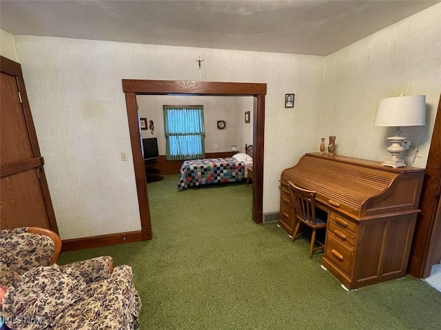 bedroom with carpet flooring and baseboards