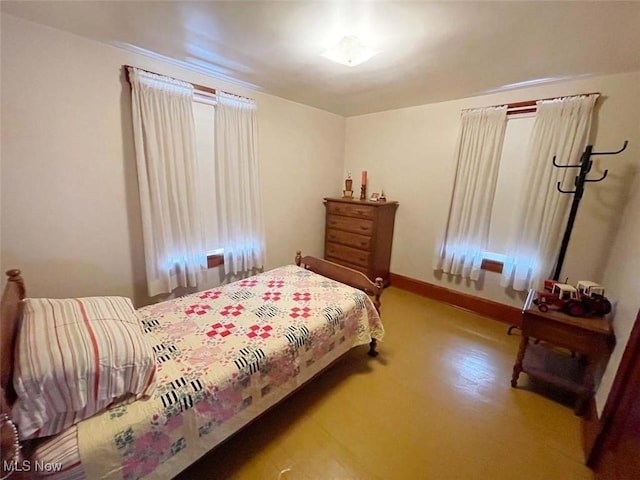 bedroom with baseboards