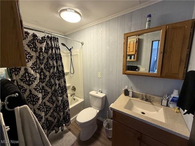 full bath featuring toilet, wooden walls, shower / tub combo, vanity, and crown molding