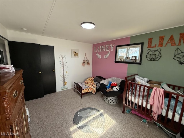 bedroom featuring carpet