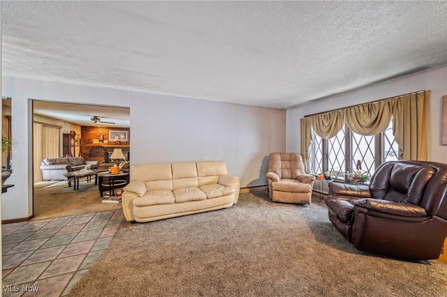 carpeted living room with a textured ceiling