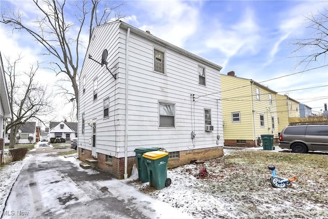 view of snow covered property