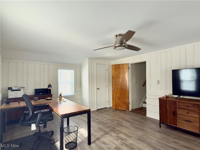 office featuring a ceiling fan and wood finished floors