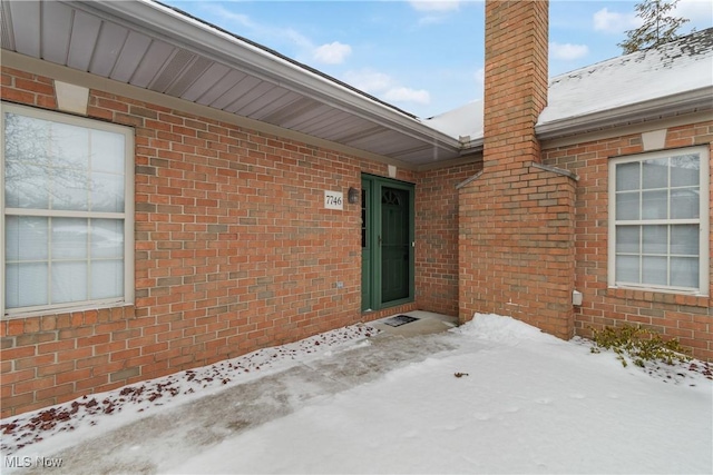 view of snow covered patio