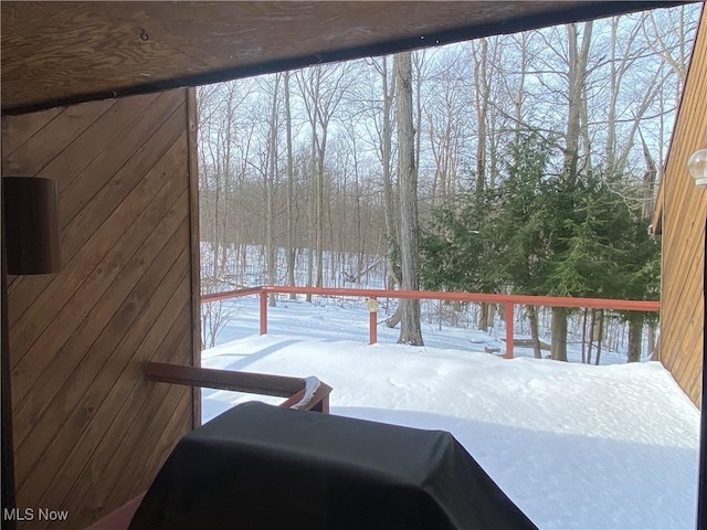 view of snow covered deck