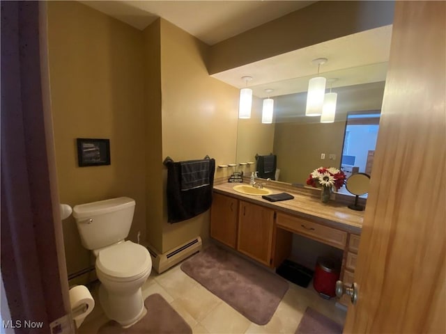 bathroom featuring toilet, a baseboard radiator, tile patterned flooring, and vanity