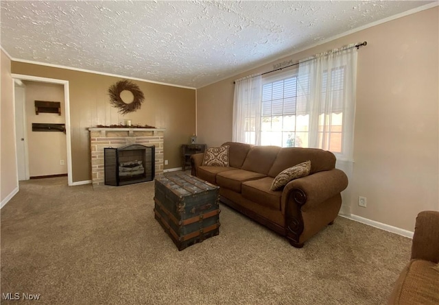 living room with a textured ceiling, carpet, a fireplace, and crown molding