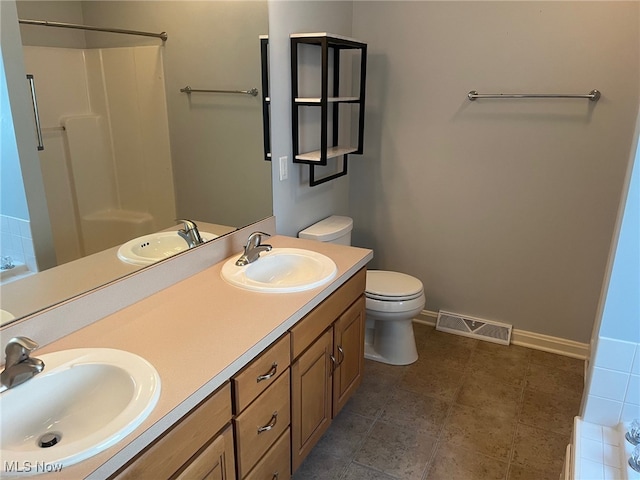 full bathroom featuring visible vents, a sink, and a bath