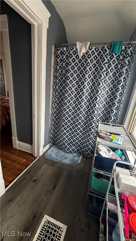 bathroom with wood finished floors